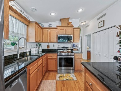 This high end Manufactured home on an Ultimately landscaped on Water Oak Country Club Estates in Florida - for sale on GolfHomes.com, golf home, golf lot