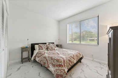 Welcome Home! Step into this light and bright first floor condo on Boca Pointe Country Club in Florida - for sale on GolfHomes.com, golf home, golf lot