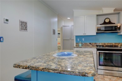 Well-maintained 2-bedroom, 2 bath home in the desirable Barefoot on Barefoot Bay Golf Course in Florida - for sale on GolfHomes.com, golf home, golf lot