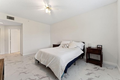 Welcome Home! Step into this light and bright first floor condo on Boca Pointe Country Club in Florida - for sale on GolfHomes.com, golf home, golf lot