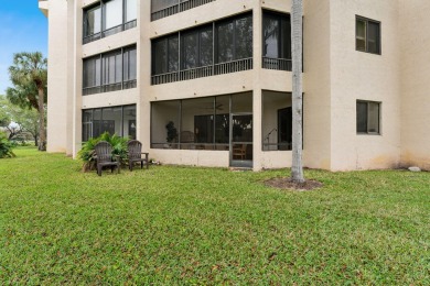 Welcome Home! Step into this light and bright first floor condo on Boca Pointe Country Club in Florida - for sale on GolfHomes.com, golf home, golf lot