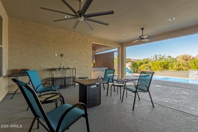 This Nearly NEW home features an amazing backyard with multiple on Tuscany Falls At Pebble Creek in Arizona - for sale on GolfHomes.com, golf home, golf lot