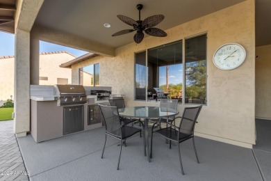 This Nearly NEW home features an amazing backyard with multiple on Tuscany Falls At Pebble Creek in Arizona - for sale on GolfHomes.com, golf home, golf lot