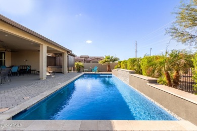 This Nearly NEW home features an amazing backyard with multiple on Tuscany Falls At Pebble Creek in Arizona - for sale on GolfHomes.com, golf home, golf lot