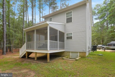 Welcome to your dream home nestled at the end of a serene on Captains Cove Golf and Yacht Club in Virginia - for sale on GolfHomes.com, golf home, golf lot