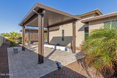 This Nearly NEW home features an amazing backyard with multiple on Tuscany Falls At Pebble Creek in Arizona - for sale on GolfHomes.com, golf home, golf lot