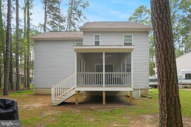 Welcome to your dream home nestled at the end of a serene on Captains Cove Golf and Yacht Club in Virginia - for sale on GolfHomes.com, golf home, golf lot