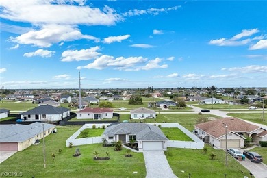 TRIPLE LOT POOL HOME IN NW CAPE CORAL - NO FLOOD INSURANCE on Burnt Store Golf Club in Florida - for sale on GolfHomes.com, golf home, golf lot