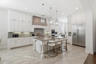 Experience luxury living with this exceptional custom home on Lantana Golf Club in Texas - for sale on GolfHomes.com, golf home, golf lot