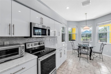 Wake up to breathtaking sunrises over the water from the comfort on University Park Country Club in Florida - for sale on GolfHomes.com, golf home, golf lot