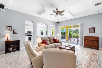 Wake up to breathtaking sunrises over the water from the comfort on University Park Country Club in Florida - for sale on GolfHomes.com, golf home, golf lot