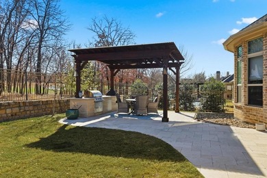 Experience luxury living with this exceptional custom home on Lantana Golf Club in Texas - for sale on GolfHomes.com, golf home, golf lot