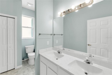 Wake up to breathtaking sunrises over the water from the comfort on University Park Country Club in Florida - for sale on GolfHomes.com, golf home, golf lot