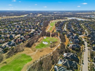 Experience luxury living with this exceptional custom home on Lantana Golf Club in Texas - for sale on GolfHomes.com, golf home, golf lot
