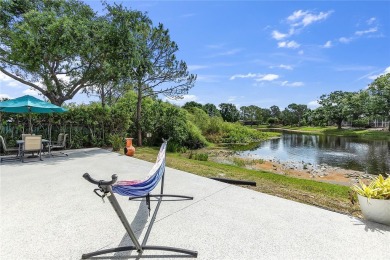 Wake up to breathtaking sunrises over the water from the comfort on University Park Country Club in Florida - for sale on GolfHomes.com, golf home, golf lot