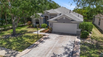 Wake up to breathtaking sunrises over the water from the comfort on University Park Country Club in Florida - for sale on GolfHomes.com, golf home, golf lot