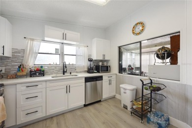 Step into modern comfort with this remodeled 1986 home situated on Maple Leaf Golf and Country Club in Florida - for sale on GolfHomes.com, golf home, golf lot