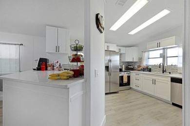Step into modern comfort with this remodeled 1986 home situated on Maple Leaf Golf and Country Club in Florida - for sale on GolfHomes.com, golf home, golf lot
