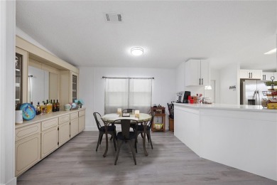 Step into modern comfort with this remodeled 1986 home situated on Maple Leaf Golf and Country Club in Florida - for sale on GolfHomes.com, golf home, golf lot