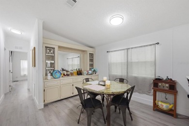 Step into modern comfort with this remodeled 1986 home situated on Maple Leaf Golf and Country Club in Florida - for sale on GolfHomes.com, golf home, golf lot