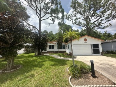 This well-cared for home is located only steps from one of the on Del Tura Golf and Country Club in Florida - for sale on GolfHomes.com, golf home, golf lot