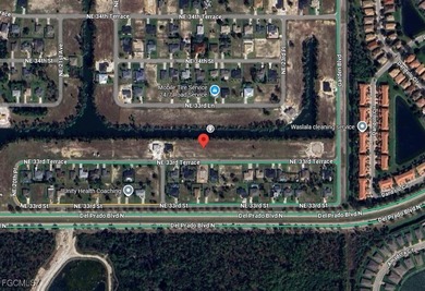 Fantastic waterfront lot in Northeast Cape Coral offering a rare on Del Tura Golf and Country Club in Florida - for sale on GolfHomes.com, golf home, golf lot