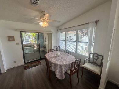 This well-cared for home is located only steps from one of the on Del Tura Golf and Country Club in Florida - for sale on GolfHomes.com, golf home, golf lot
