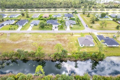 Fantastic waterfront lot in Northeast Cape Coral offering a rare on Del Tura Golf and Country Club in Florida - for sale on GolfHomes.com, golf home, golf lot