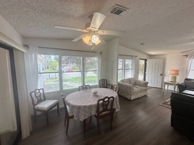 This well-cared for home is located only steps from one of the on Del Tura Golf and Country Club in Florida - for sale on GolfHomes.com, golf home, golf lot