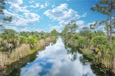 Fantastic waterfront lot in Northeast Cape Coral offering a rare on Del Tura Golf and Country Club in Florida - for sale on GolfHomes.com, golf home, golf lot