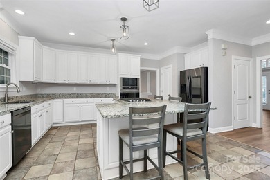 Traditional all-brick 6BR, 4BA home on the 6th tee box of on Birkdale Golf Club in North Carolina - for sale on GolfHomes.com, golf home, golf lot