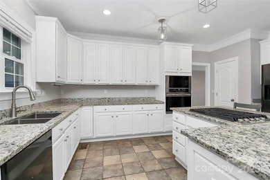 Traditional all-brick 6BR, 4BA home on the 6th tee box of on Birkdale Golf Club in North Carolina - for sale on GolfHomes.com, golf home, golf lot