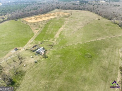 This exceptional property offers a prime location in the heart on Woods Golf Course in Georgia - for sale on GolfHomes.com, golf home, golf lot