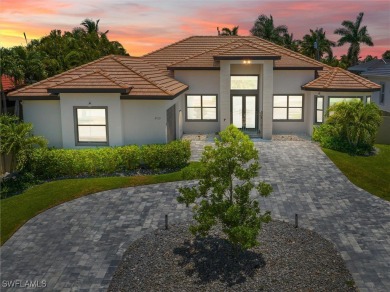 Exquisite modern contemporary 4 Bedroom 3 bath pool home in on Royal Tee Country Club in Florida - for sale on GolfHomes.com, golf home, golf lot