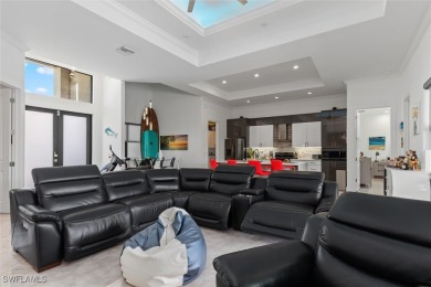 Exquisite modern contemporary 4 Bedroom 3 bath pool home in on Royal Tee Country Club in Florida - for sale on GolfHomes.com, golf home, golf lot