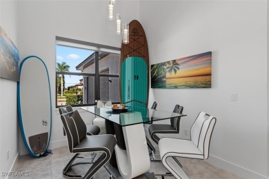 Exquisite modern contemporary 4 Bedroom 3 bath pool home in on Royal Tee Country Club in Florida - for sale on GolfHomes.com, golf home, golf lot
