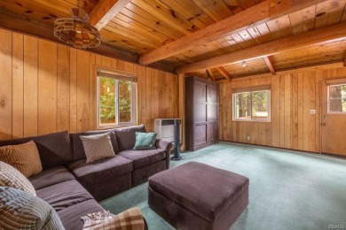 Enveloped by a quiet grove of mature pines and backing to a on Big Bear Mountain Ski and Golf Resort in California - for sale on GolfHomes.com, golf home, golf lot