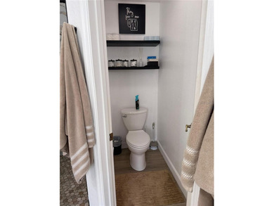 Beautifully maintained and updated 4 bed/2 bath home on a on Wedgefield Golf Club in Florida - for sale on GolfHomes.com, golf home, golf lot