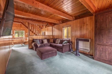 Enveloped by a quiet grove of mature pines and backing to a on Big Bear Mountain Ski and Golf Resort in California - for sale on GolfHomes.com, golf home, golf lot