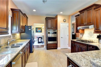 A truly coveted *Christopher Wren* model overlooking the fairway on Colonial Heritage Golf Club in Virginia - for sale on GolfHomes.com, golf home, golf lot