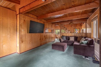 Enveloped by a quiet grove of mature pines and backing to a on Big Bear Mountain Ski and Golf Resort in California - for sale on GolfHomes.com, golf home, golf lot