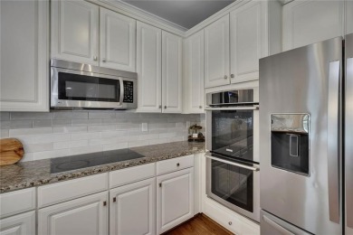 Welcome to your dream home in the highly coveted, resort-style on Towne Lake Hills Golf Club in Georgia - for sale on GolfHomes.com, golf home, golf lot
