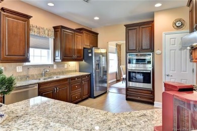 A truly coveted *Christopher Wren* model overlooking the fairway on Colonial Heritage Golf Club in Virginia - for sale on GolfHomes.com, golf home, golf lot