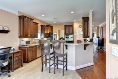 A truly coveted *Christopher Wren* model overlooking the fairway on Colonial Heritage Golf Club in Virginia - for sale on GolfHomes.com, golf home, golf lot