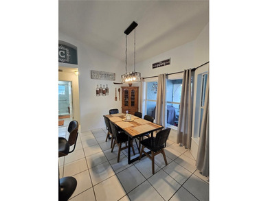 Beautifully maintained and updated 4 bed/2 bath home on a on Wedgefield Golf Club in Florida - for sale on GolfHomes.com, golf home, golf lot