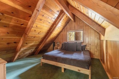 Enveloped by a quiet grove of mature pines and backing to a on Big Bear Mountain Ski and Golf Resort in California - for sale on GolfHomes.com, golf home, golf lot