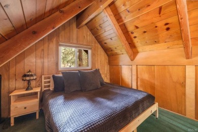 Enveloped by a quiet grove of mature pines and backing to a on Big Bear Mountain Ski and Golf Resort in California - for sale on GolfHomes.com, golf home, golf lot