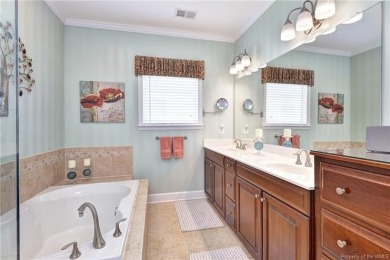 A truly coveted *Christopher Wren* model overlooking the fairway on Colonial Heritage Golf Club in Virginia - for sale on GolfHomes.com, golf home, golf lot