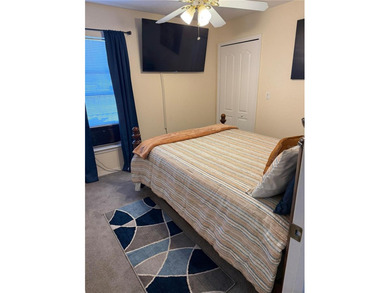 Beautifully maintained and updated 4 bed/2 bath home on a on Wedgefield Golf Club in Florida - for sale on GolfHomes.com, golf home, golf lot