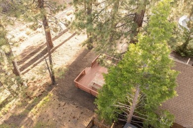 Enveloped by a quiet grove of mature pines and backing to a on Big Bear Mountain Ski and Golf Resort in California - for sale on GolfHomes.com, golf home, golf lot